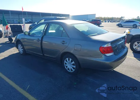 2006 Toyota Camry Le z USA, uszkodzony, nr VIN 4T1BE32K16U671734